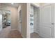 Hallway with linen closet and shelving at 2211 Longleaf Rd, Davenport, FL 33837