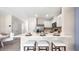 Kitchen island with seating for four, perfect for casual dining at 2211 Longleaf Rd, Davenport, FL 33837
