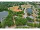 Aerial view of Trotwood Park, featuring a pond and recreational fields at 600 Northern Way # 1608, Winter Springs, FL 32708