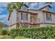 Two-story condo with private balcony, lush landscaping, and a charming exterior at 600 Northern Way # 1608, Winter Springs, FL 32708