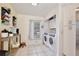 Convenient laundry room with washer and dryer at 600 Northern Way # 1608, Winter Springs, FL 32708