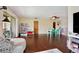 Living area with hardwood floors and access to balcony at 600 Northern Way # 1608, Winter Springs, FL 32708