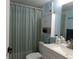 Full bathroom with shower/tub combo and white vanity at 110 Cypress Woods Ct # 5C, Deltona, FL 32725