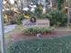 Lakeside Condominiums sign with holiday wreath at 110 Cypress Woods Ct # 5C, Deltona, FL 32725