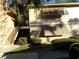 Condo building with stairs, landscaping, and shutters at 110 Cypress Woods Ct # 5C, Deltona, FL 32725