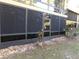 Condo building with screened-in patio area at 110 Cypress Woods Ct # 5C, Deltona, FL 32725