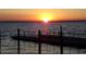 Amazing sunset view over calm lake water at 110 Cypress Woods Ct # 5C, Deltona, FL 32725