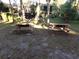 Two wooden picnic tables in a shaded area at 110 Cypress Woods Ct # 5C, Deltona, FL 32725