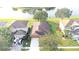Aerial view of house near lake in residential neighborhood at 12755 Oulton Cir, Orlando, FL 32832