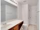 Clean bathroom with single vanity, toilet, and linen closet at 12755 Oulton Cir, Orlando, FL 32832