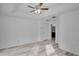 Bedroom with wood floors and door to bathroom at 12755 Oulton Cir, Orlando, FL 32832
