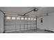Spacious garage with automatic opener and ample storage space at 12755 Oulton Cir, Orlando, FL 32832
