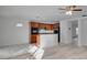 Kitchen with dark wood cabinets and granite countertops at 12755 Oulton Cir, Orlando, FL 32832