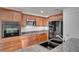 Kitchen with stainless steel appliances and granite counters at 12755 Oulton Cir, Orlando, FL 32832