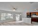 Kitchen with dark wood cabinets and granite countertops at 12755 Oulton Cir, Orlando, FL 32832