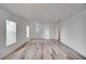 Spacious living room with hardwood floors and neutral walls at 12755 Oulton Cir, Orlando, FL 32832