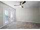 Bedroom with French doors and ceiling fan at 203 Red Bud Ln, Longwood, FL 32779