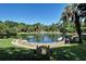 Relaxing community pool with a stone border, perfect for residents at 203 Red Bud Ln, Longwood, FL 32779