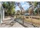 Deck overlooks a spacious backyard at 203 Red Bud Ln, Longwood, FL 32779