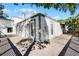 Large deck wraps around the house, offering ample outdoor space at 203 Red Bud Ln, Longwood, FL 32779