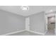 Grey bedroom with access to a full bathroom at 2316 Douglas Thomas Ct, Orlando, FL 32807