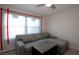 Living room with sectional sofa and coffee table at 2564 Grassy Point Dr # 106, Lake Mary, FL 32746