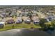 Aerial view of neighborhood and canal at 3149 Bear Path, Kissimmee, FL 34746