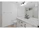 Modern bathroom, featuring a white vanity and marble tile at 3149 Bear Path, Kissimmee, FL 34746