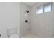 Large walk-in shower with marble tile and modern fixtures at 3149 Bear Path, Kissimmee, FL 34746