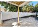 Backyard patio and white vinyl fence at 36 Marigold Ln, Debary, FL 32713
