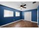 Spacious bedroom with double door closet and ceiling fan at 36 Marigold Ln, Debary, FL 32713