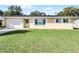 Newly renovated Ranch style home with a spacious lawn and attached garage at 36 Marigold Ln, Debary, FL 32713