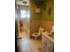 Clean bathroom with shower, toilet and tiled floors at 3733 Mohawk Dr, Mount Dora, FL 32757