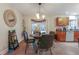 Bright kitchen with dining area and French doors leading to the outdoors at 402 Satsuma Dr, Sanford, FL 32771
