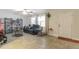 Cozy living room featuring a leather sofa and built-in shelving at 402 Satsuma Dr, Sanford, FL 32771