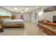 Large main bedroom with sliding glass doors, ceiling fan, and lots of natural light at 402 Satsuma Dr, Sanford, FL 32771