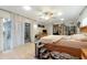 Spacious Primary bedroom with light flooring and backyard access at 402 Satsuma Dr, Sanford, FL 32771