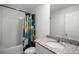 Clean bathroom with granite vanity and shower/tub at 4932 Mainsail St, Haines City, FL 33844