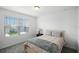 Cozy bedroom with a double bed and window at 4932 Mainsail St, Haines City, FL 33844