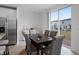 Kitchen dining area with table and chairs, sliding doors to backyard at 4932 Mainsail St, Haines City, FL 33844
