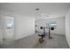 Home gym with weight bench and pull-up bar at 4932 Mainsail St, Haines City, FL 33844