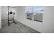 Bright home gym with pull-up bar and window at 4932 Mainsail St, Haines City, FL 33844