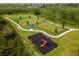 playground with play structures and safe surface at 4932 Mainsail St, Haines City, FL 33844