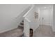 Bright entryway with carpeted stairs and tile flooring at 4932 Mainsail St, Haines City, FL 33844