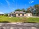 House with detached garage and expansive yard at 495 Guerrant St, Umatilla, FL 32784