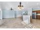 Modern kitchen with stainless steel appliances and an island at 5810 Penney Ln, The Villages, FL 32163