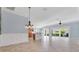 Spacious living area with tile floors and an open floor plan at 5810 Penney Ln, The Villages, FL 32163