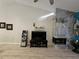 Modern fireplace with stone surround and built-in shelving at 1075 Kensington Park Dr # 203, Altamonte Springs, FL 32714