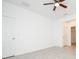 Spacious bedroom with a ceiling fan and tile floors at 15460 Sw 47Th Avenue Rd, Ocala, FL 34473