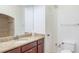 Bathroom with granite countertop vanity and tile shower/tub combo at 213 Villa Di Este Ter # 113, Lake Mary, FL 32746